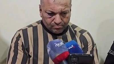 نكّل بجثث المعتقلين... القبض على ضابط بنظام الأسد