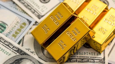 ارتفاع الدولار يدفع بالذهب الى الهبوط 