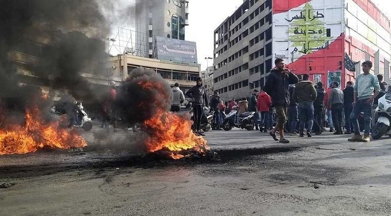 وثائق عن توزيع آلاف الدولارات على "قادة المحاور" خلال "أحداث طرابلس"... ما علاقة عميد حمود؟