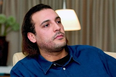 بالصور: وكيلا القذافي يتقدمان بطلب لإلغاء الكفالة او تخفيضها