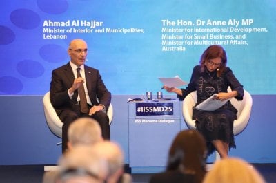 الحجار من المنامة: إسرائيل خرقت التهدئة... وإعادة الإعمار أولوية