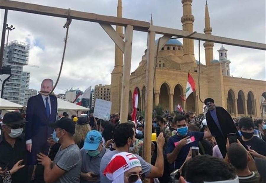 الرد على مشانق ساحة الشهداء الرد على مشانق ساحة الشهداء