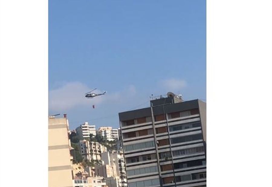 بالفيديو: طوافة للجيش تساهم بإطفاء حريق "دير الصليب"