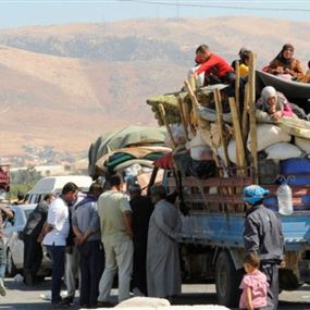 عودة طوعيّة لمئات النازحين إلى سوريا الأحد