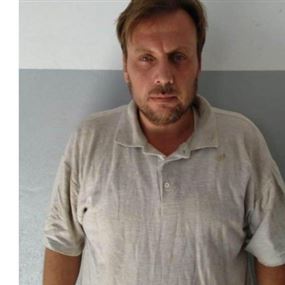 تعميم صورة موقوف بجرمي تزوير وترويج عملة مزيفة