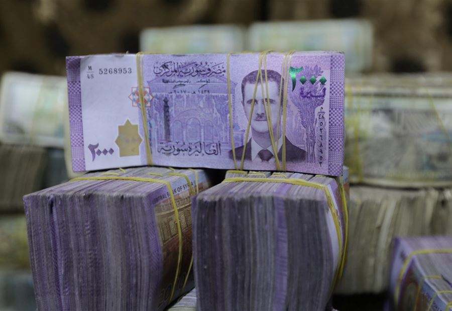 سوريا تخفض سعر صرف الليرة الرسمي مقابل الدولار