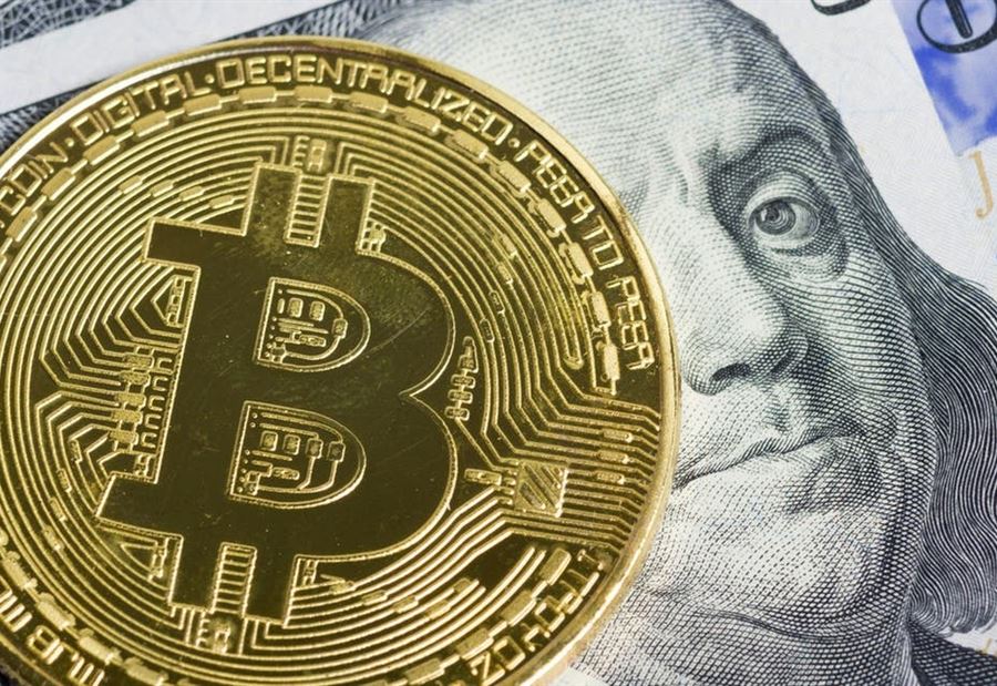 "هل تنهي "بيتكوين" حقبة العملات الورقية؟"