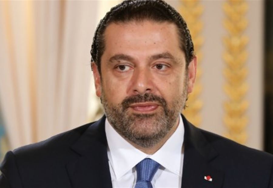 الحريري يعايد المعلم في عيده