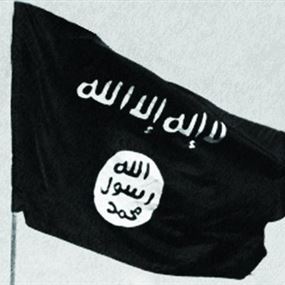 راية "داعش" بجانب جثة المشتبه به باعتداءات باريس