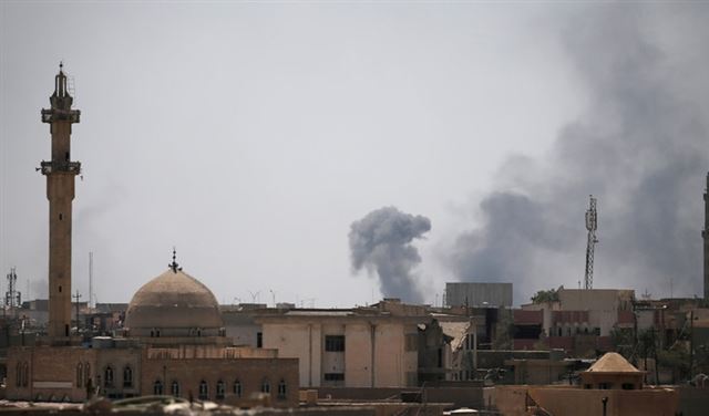 مقتل صحفيين عراقي وفرنسي في الموصل