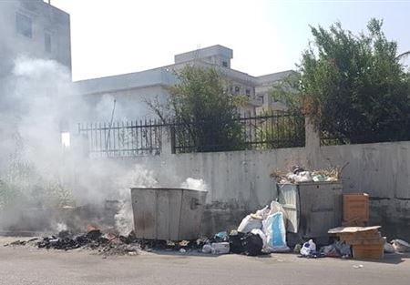 بلدية المنية توضح سبب تراكم النفايات