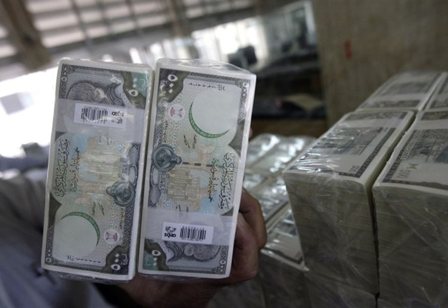 الليرة السورية تهبط الى مستوى قياسي جديد الليرة السورية تهبط الى مستوى قياسي جديد