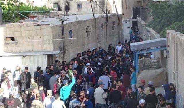 خروج 568 مسلحا من حي برزة بدمشق  خروج 568 مسلحا من حي برزة بدمشق