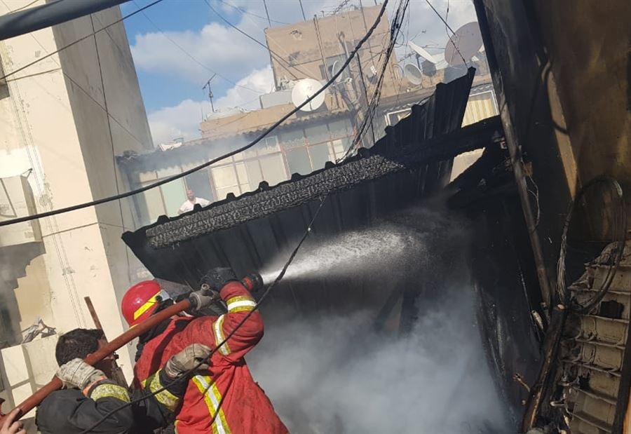 إخماد حريق في مبنى بالطريق الجديدة