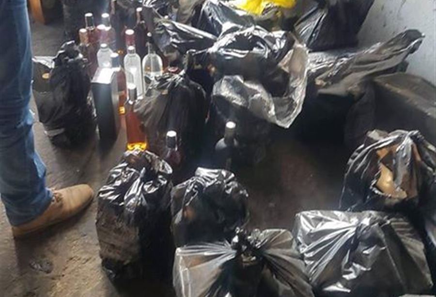 بالصور: مداهمة مستودع ويسكي في زحلة