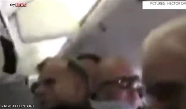  رعب ركاب طائرة اشتعل جناحها