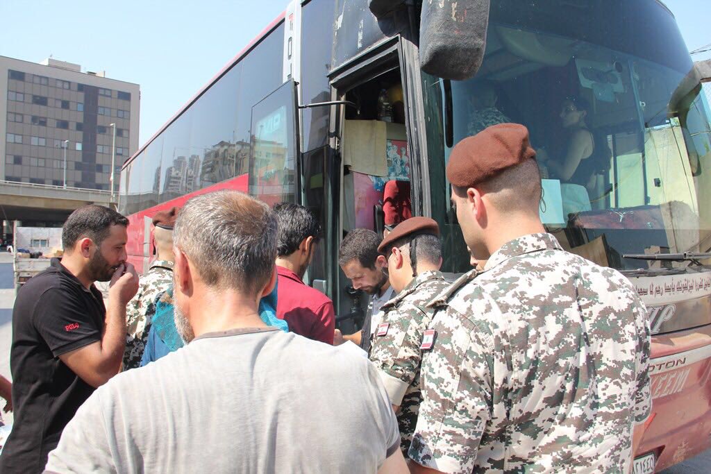 بالصور: تأمين عودة 541 نازحاً سورياً 
