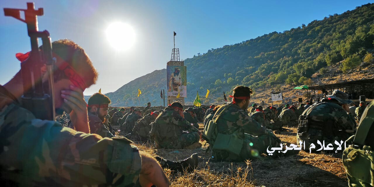 بالصور: عناصر حزب الله يحيون ذكرى دينية